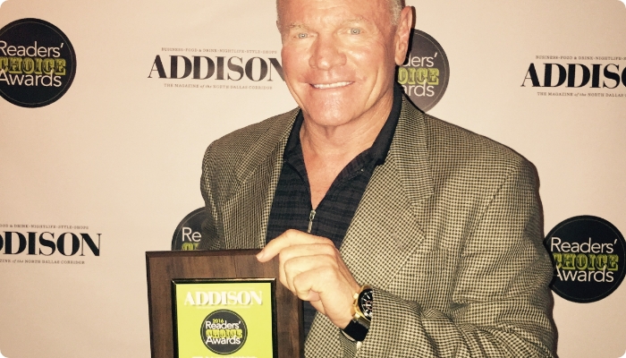 Image of Neora Founder and CEO Jeff Olson holding his Addison Magazine Readers’ Choice Award for 2016